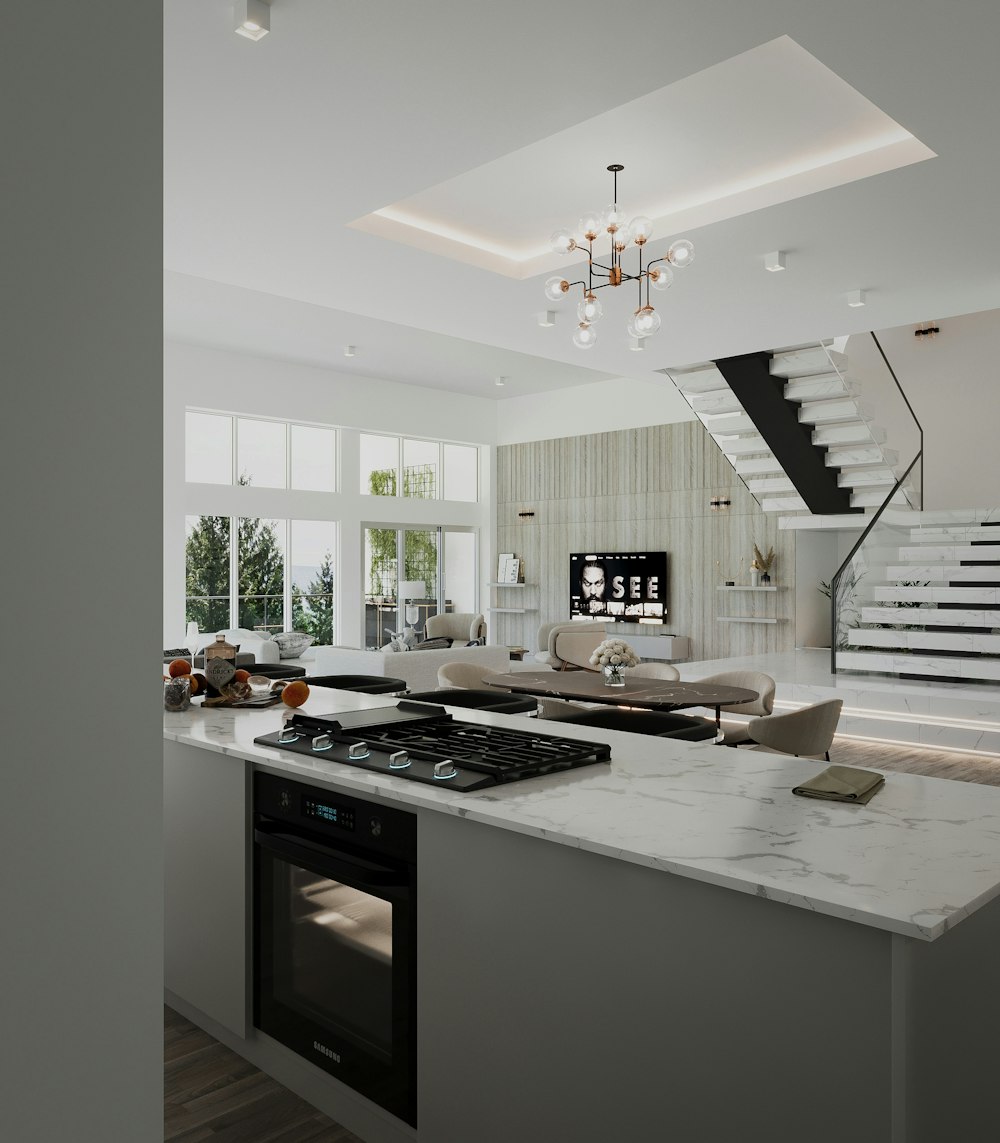 a kitchen with a stove top oven next to a staircase