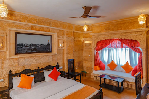 High-resolution photo of a stylish, modern bedroom in Leozone Hospitality with Mexican-inspired decor and soft natural light.