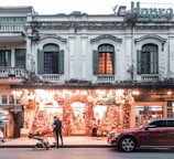 Photo of a local business storefront with vibrant decorations.
