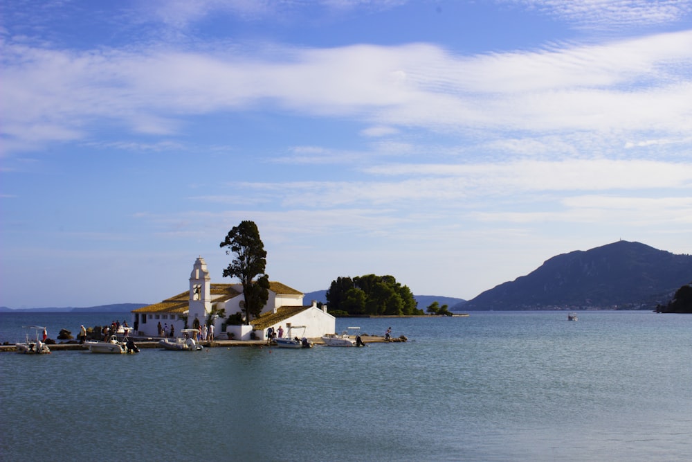 a church on a small island in the middle of a lake