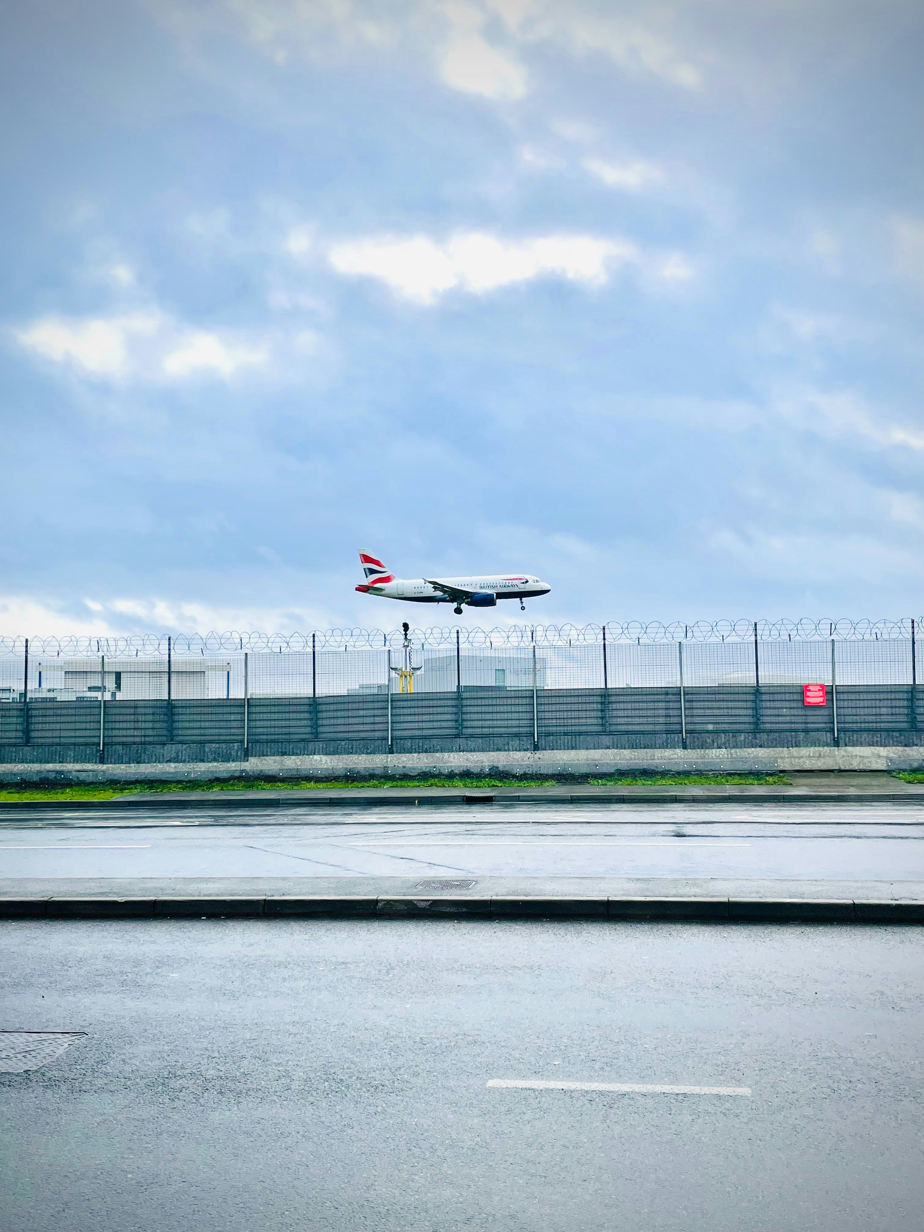 a plane is taking off from an airport runway