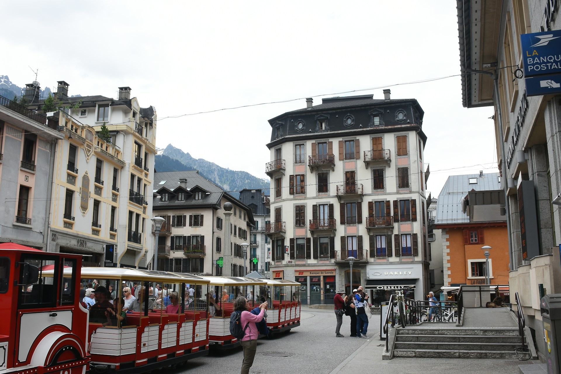 woman wearing yellow long-sleeved dress under white clouds and blue sky during daytime