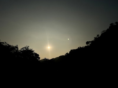 A serene landscape with a sunset, evoking a sense of peace.