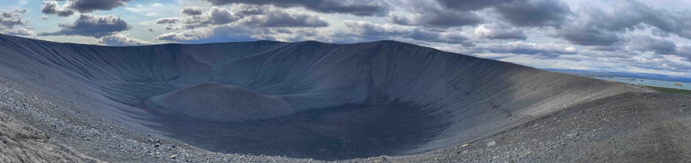 a large mountain with a very large crater in the middle of it