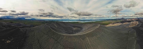 A panoramic view of Molokini Crater from above.