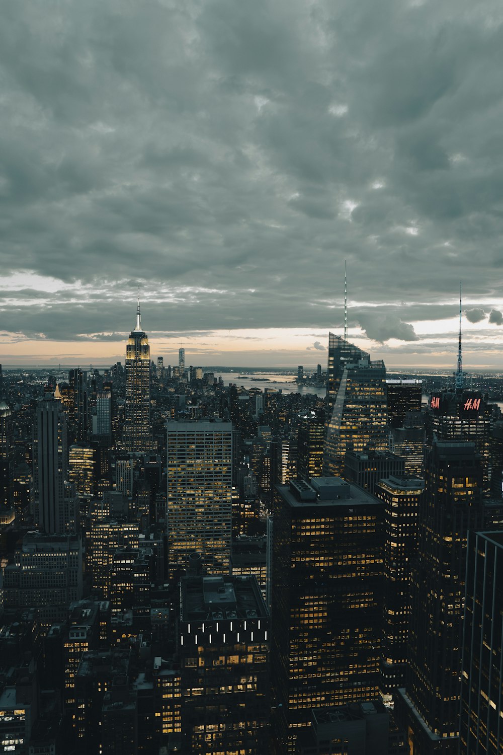 a view of a city at night from the top of a building