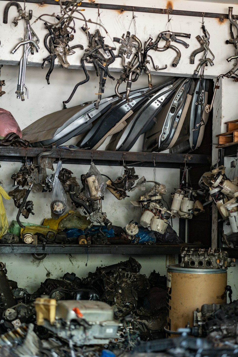 a room filled with lots of assorted metal items