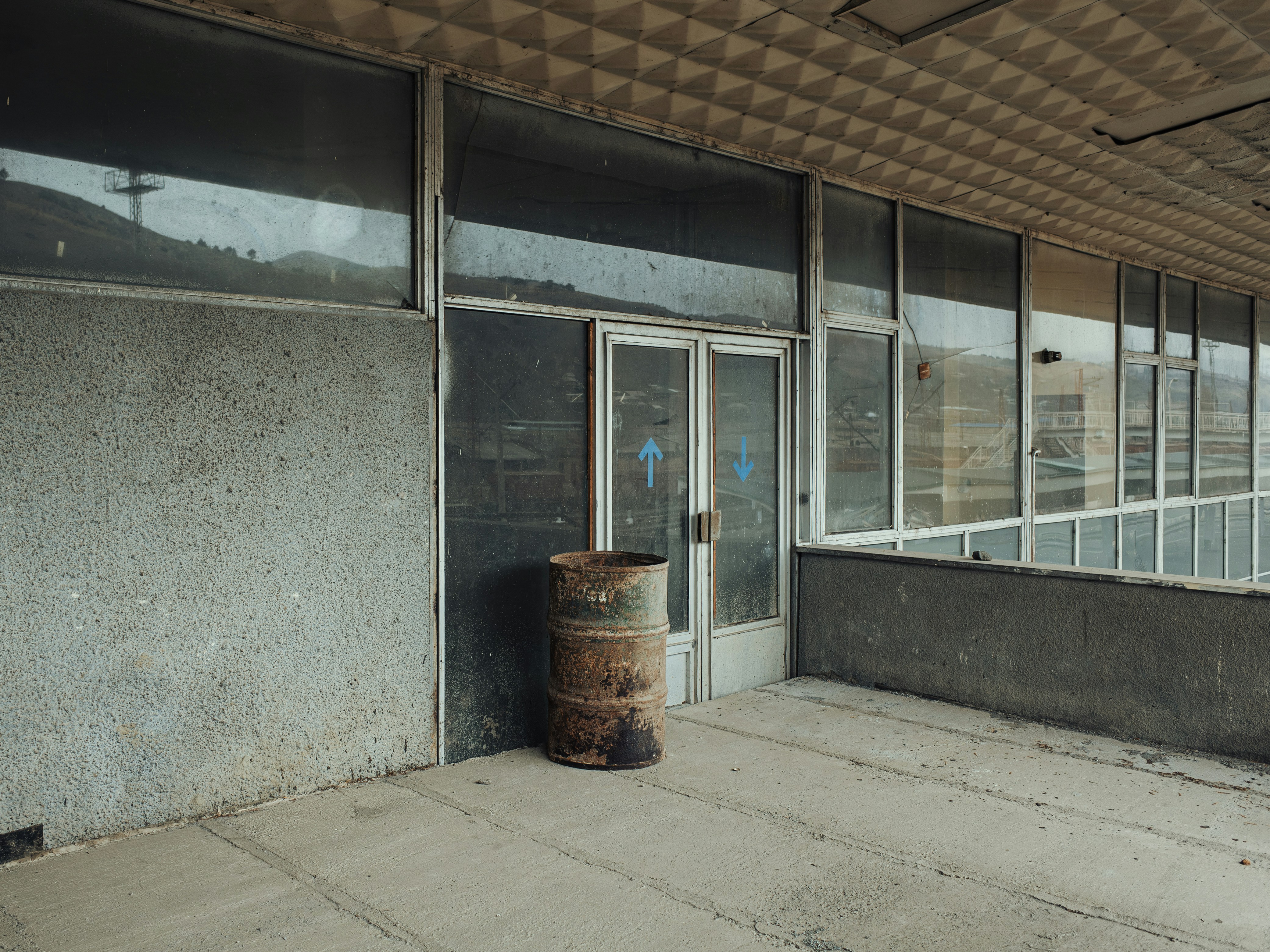 Trash can in front of building
