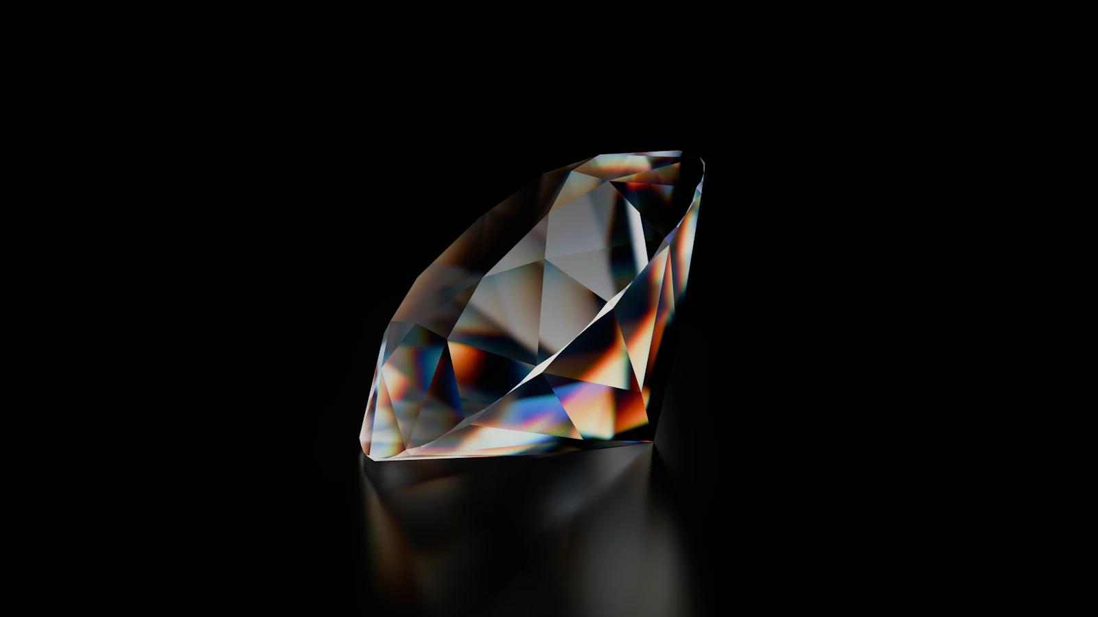 Single brilliant cut diamond catching light on a black background
