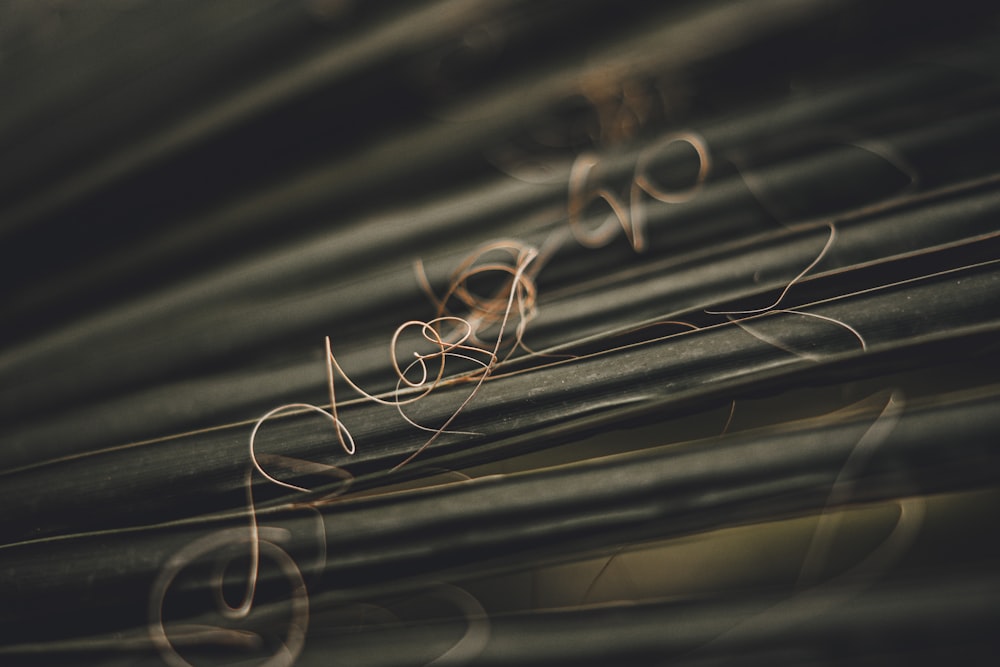 a close up of a window with the word love spelled in cursive writing