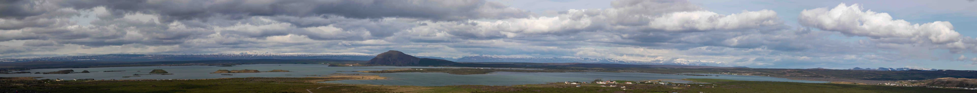 A wide-angle landscape frame showing sweeping nature with rich color grading.