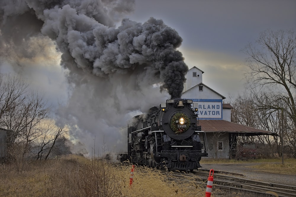 a train with black smoke coming out of it