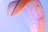 Close-up of a smiling first-time paraglider preparing for takeoff with a colorful wing.