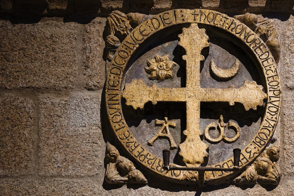 a cross on the side of a building