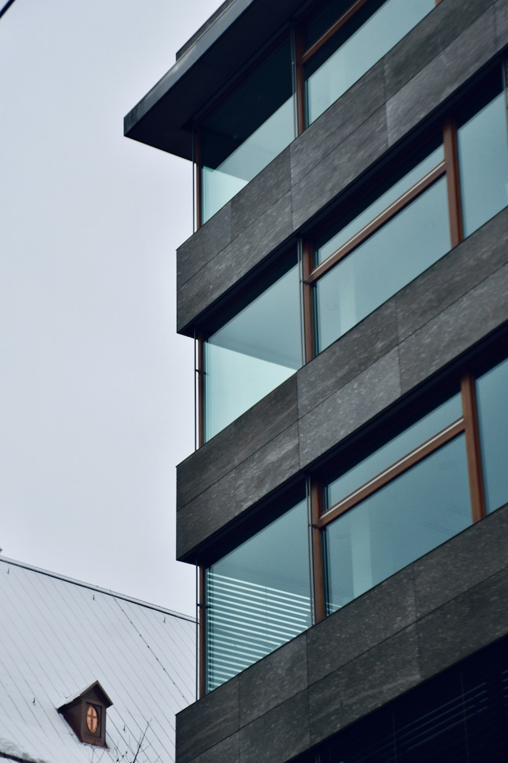 a tall building with a clock on the side of it