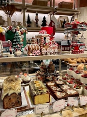 A festive scene showing a wooden dessert table with themed decorations.