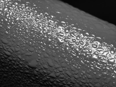 Smooth gloss coating applied on printed material showcasing shine and detail.