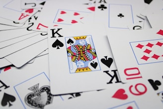 a pile of playing cards sitting on top of each other