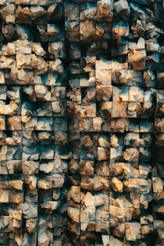 3D rendered granite blocks with measurement annotations in the vyaparwale app interface.