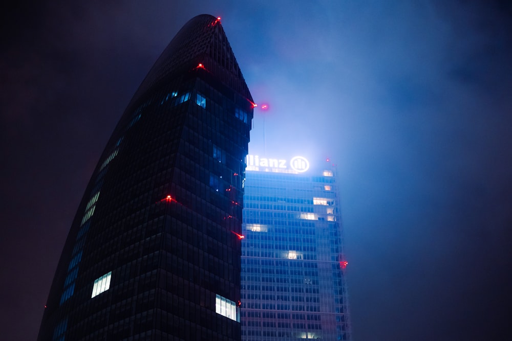 a very tall building lit up at night