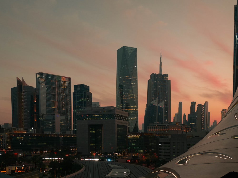 a view of a city skyline at sunset