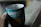 Close-up of a vibrant custom-printed mug with a heartfelt message, held by a cheerful customer.