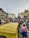 A scenic view of a vibrant Indian market bustling with people.