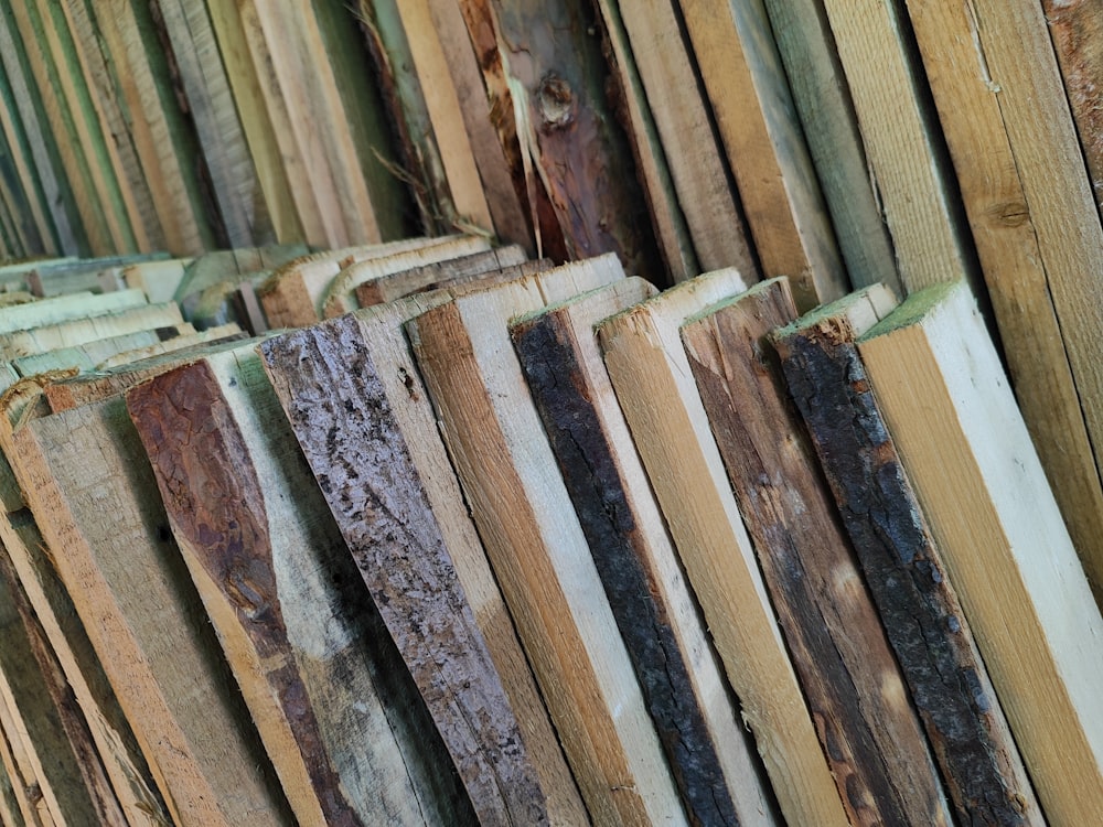 a pile of wooden boards stacked on top of each other