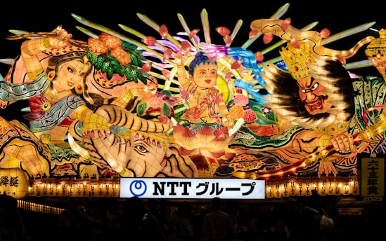 A colorful animated scene showing Tenali Rama cleverly outsmarting his rivals in a lively village setting.