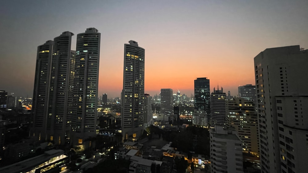 a view of a city at night from a high rise building