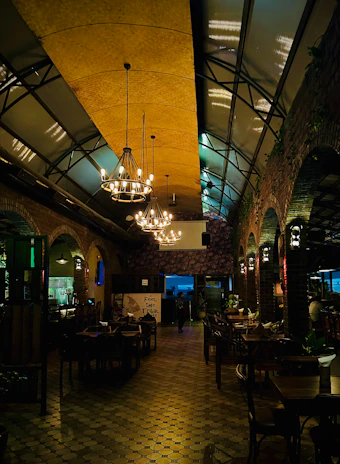 Cozy Italian trattoria with warm lighting and rustic decor.