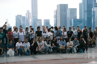 A dynamic group participating in an interactive team-building activity in a modern city venue.