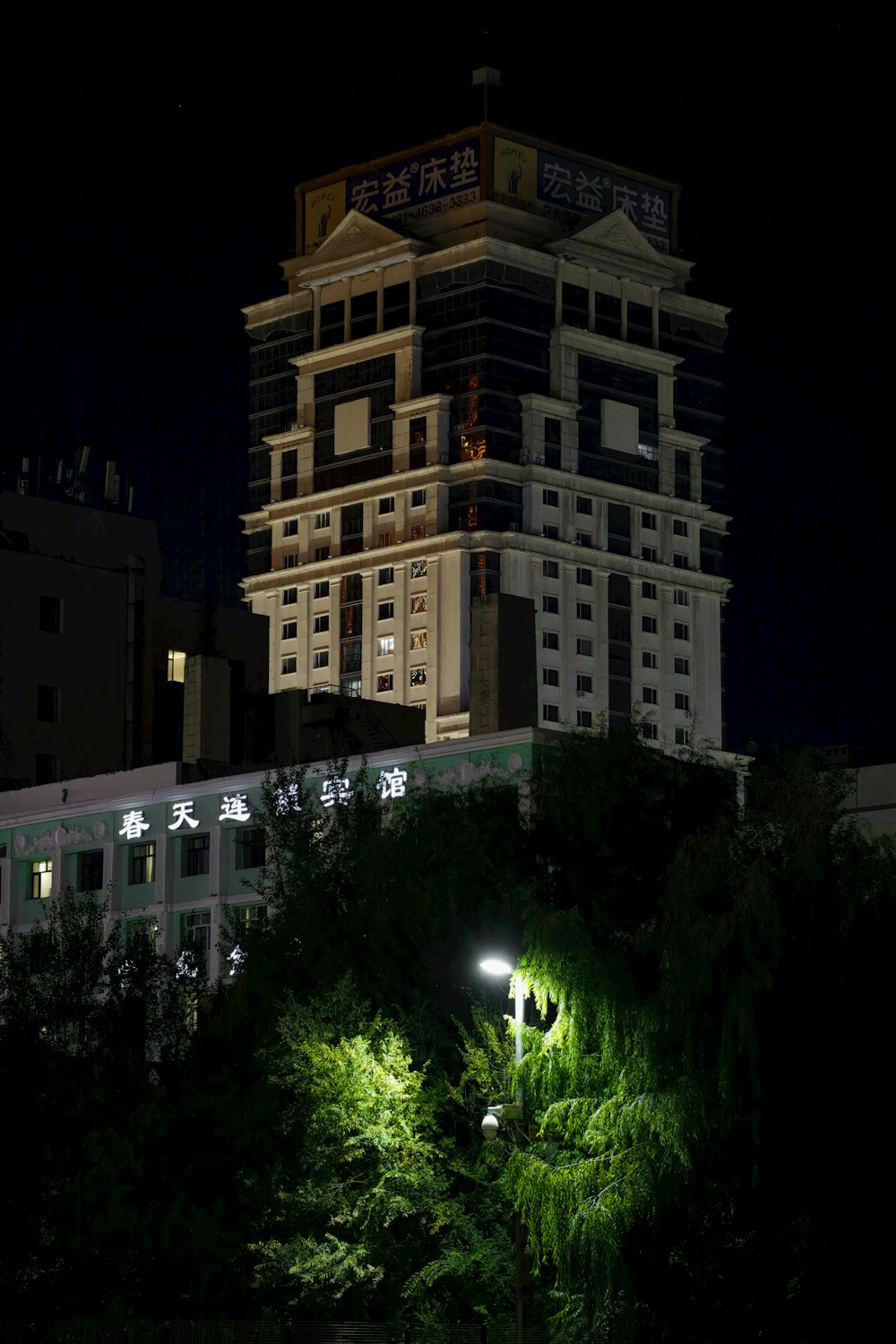 a tall building with a clock on the top of it