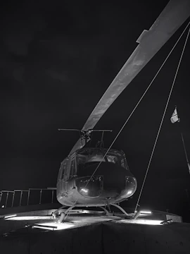 Close-up of a helipad's safety lighting system glowing at dusk.
