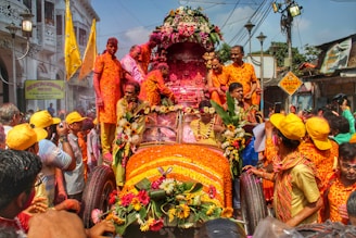 A vibrant wedding procession with decorated vehicles and joyful guests in Aurangabad.