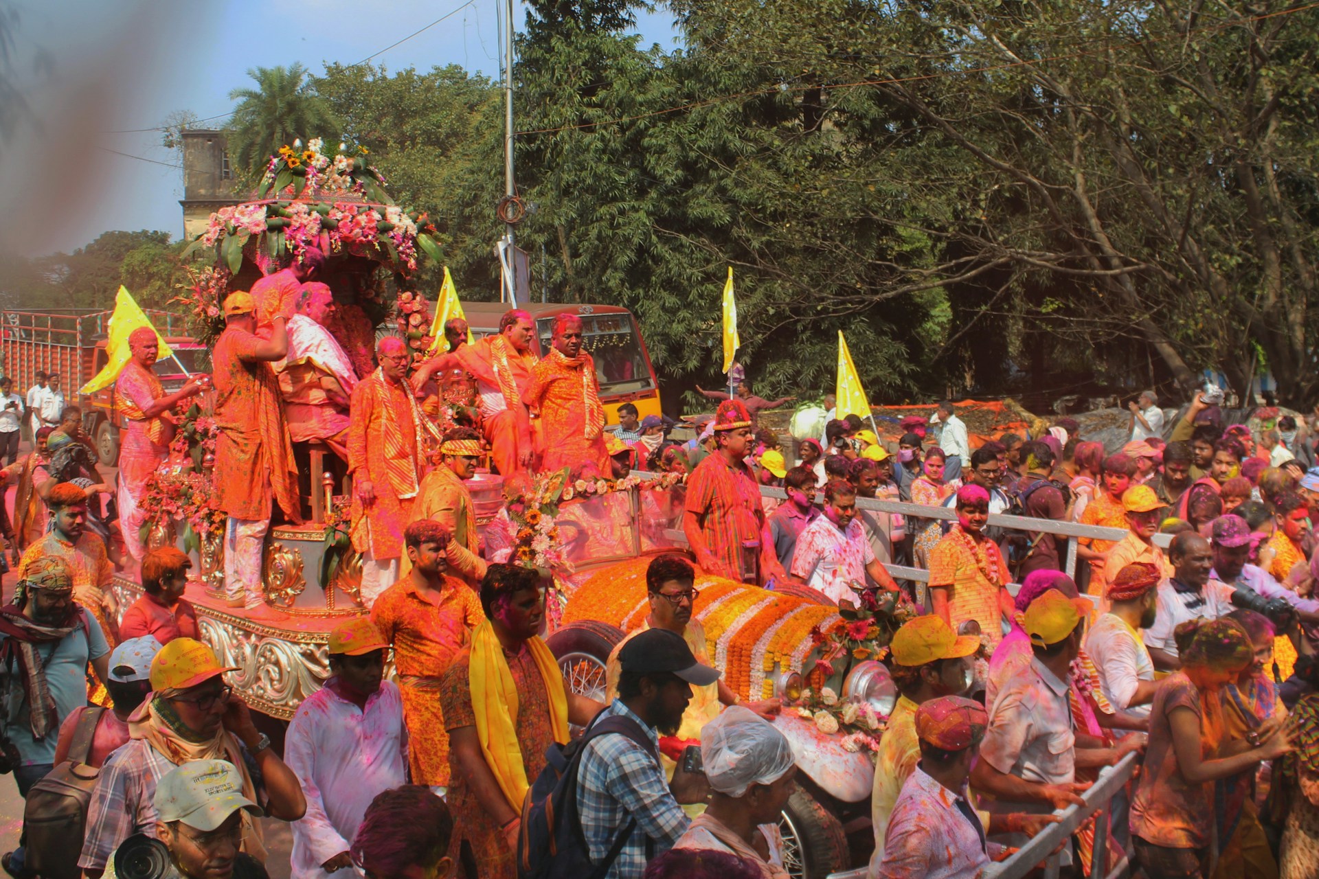 A lively parade with floats adorned with festive decorations and cheerful performers.