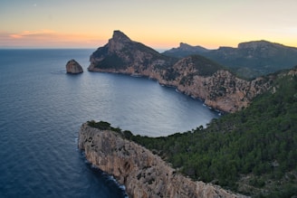 a large body of water surrounded by mountains at cape Formentor Mallorca