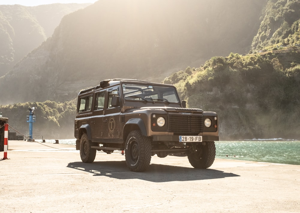 a jeep is parked on the side of the road