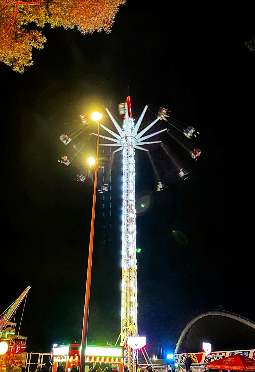 a ferris wheel at a carnival at night