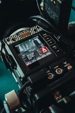 a close up of a video camera on a tripod