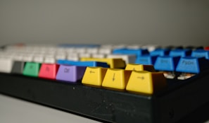 Close-up of colorful keycaps arranged neatly on a keyboard.