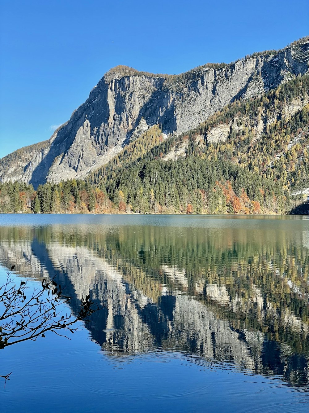 a lake with a mountain in the background