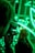 A photographer takes a picture with a camera while vibrant green lights illuminate the background. The scene focuses on a bokeh effect created by the lights, possibly of stringed or decorative type. A person stands in the background, slightly out of focus.