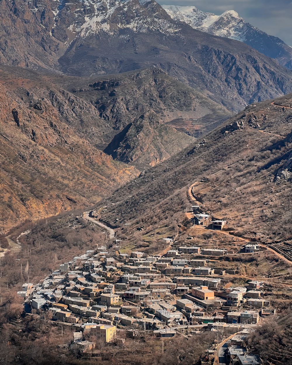 a small village in the middle of a mountain range