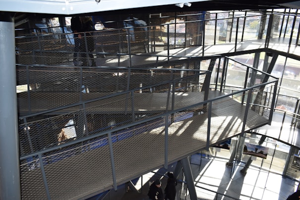 Close-up of a mezzanine floor structure with safety railings and clear walkways.