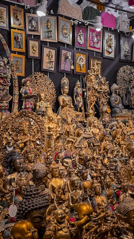 A serene display of various divine art sculptures arranged elegantly.