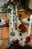 Simple dining area styled with handmade table runner and candles.
