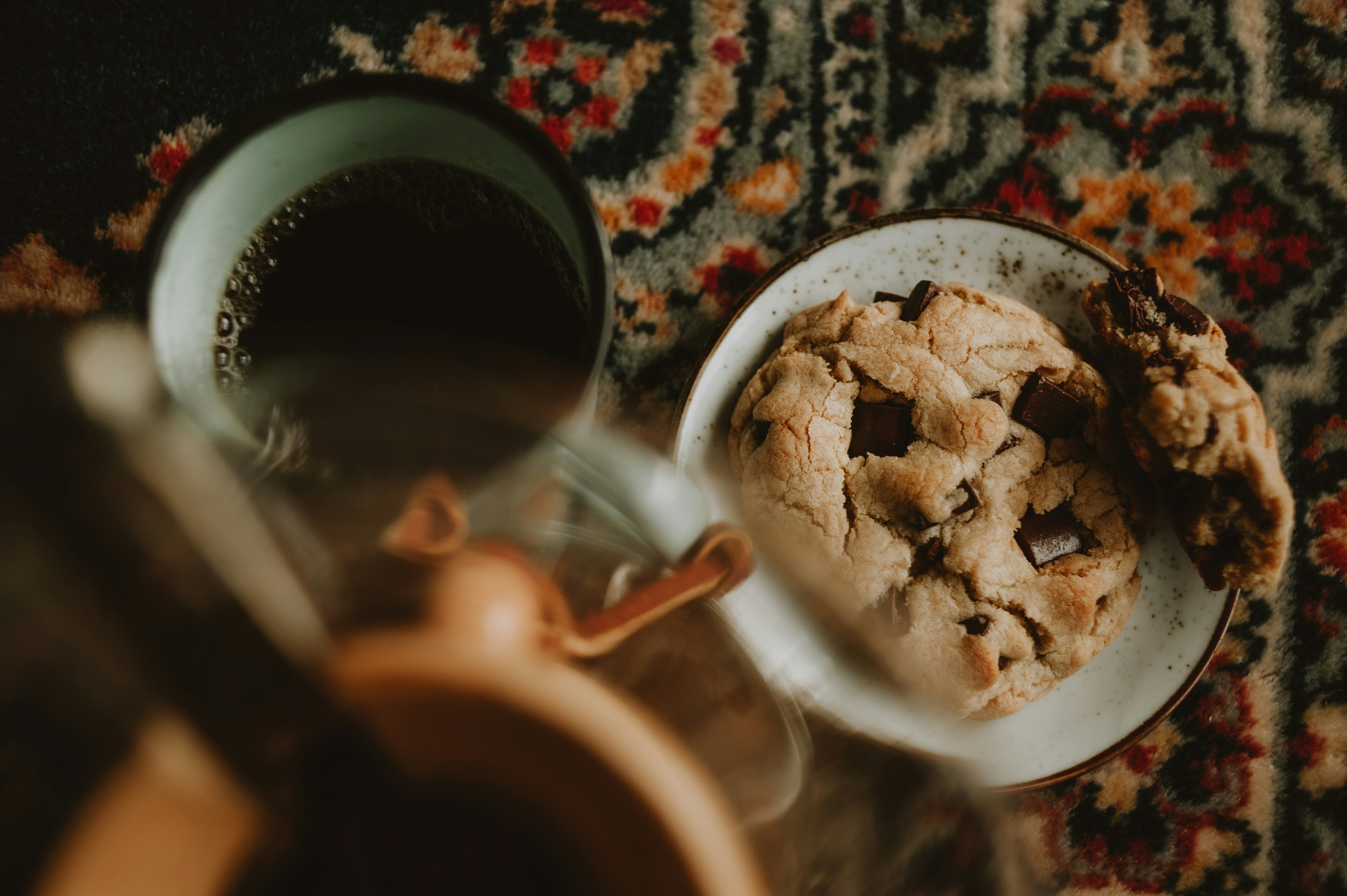a plate of cookies and a cup of coffee
