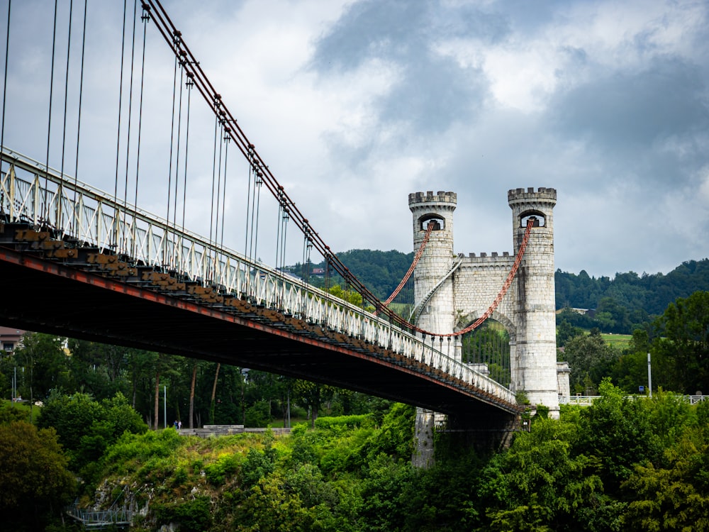 a bridge that has a tower on top of it