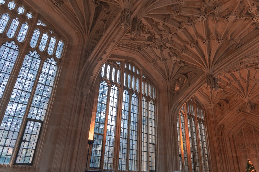 a large cathedral with many windows and a statue